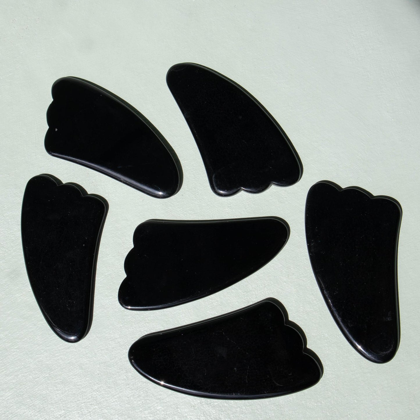 gua sha, black obsidian, obsidian, black obsidian gua sha, crystal gua sha, gemstone gua sha, black obsidian crystal, black obsidian stone, black obsidian tool, black obsidian properties, black obsidian healing properties, black obsidian metaphysical properties, black obsidian meaning, obsidian crystal, obsidian properties, obsidian meaning