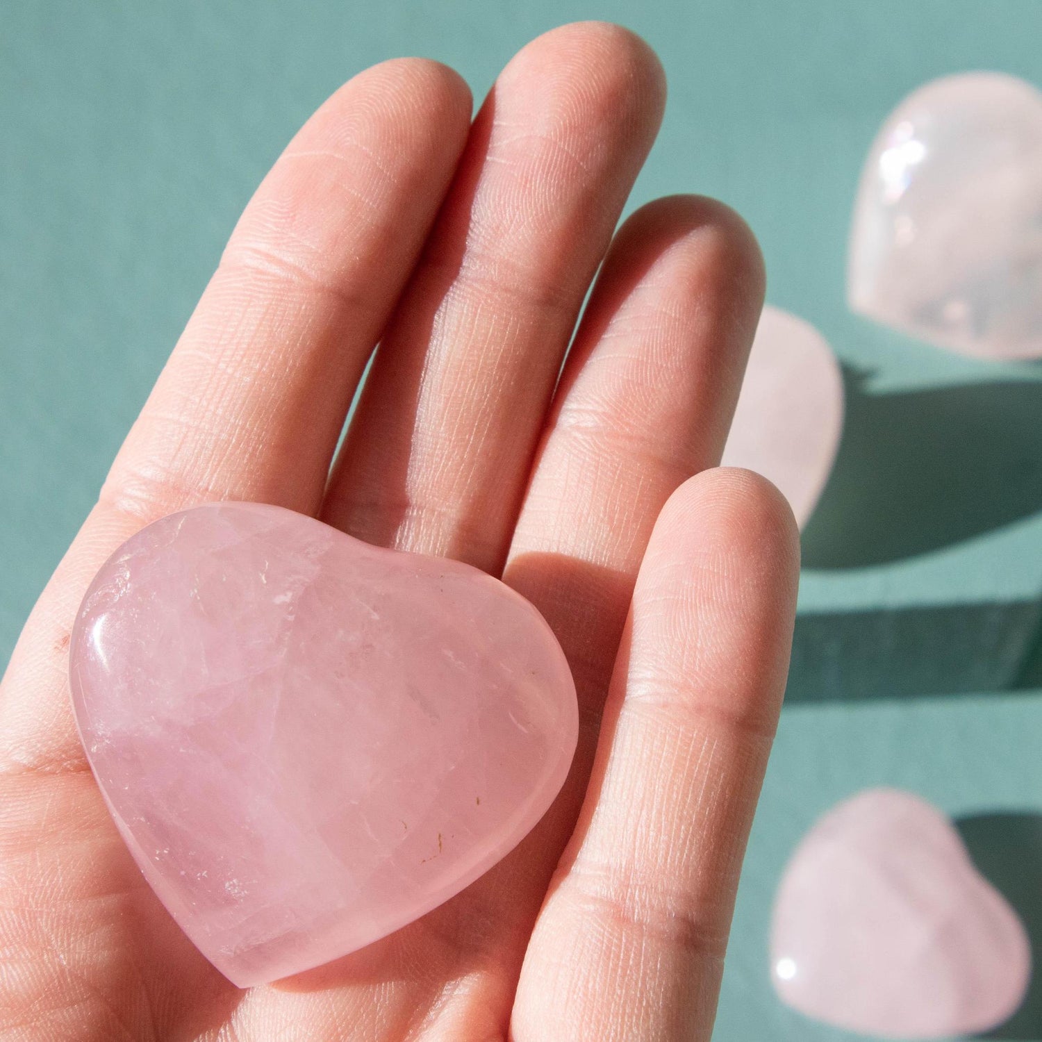 rose quartz, rose quartz crystal, rose quartz heart, rose quartz crystal heart, rose quartz metaphysical properties, rose quartz meaning
