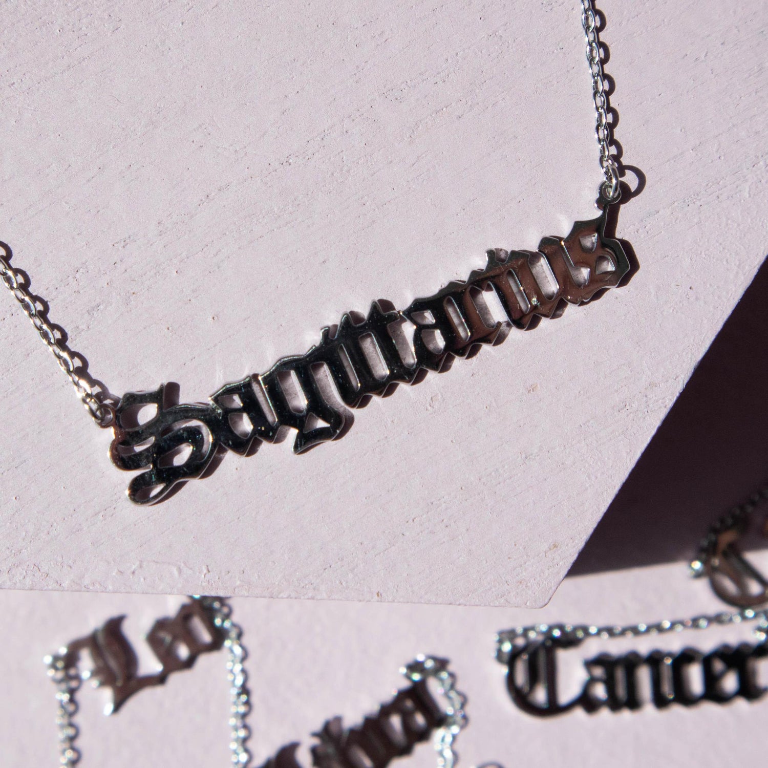 sagittarius, sagittarius chain, sagittarius necklace, sagittarius jewelry, sagittarius script necklace, sagittarius zodiac sign, zodiac sign, zodiac sign necklace