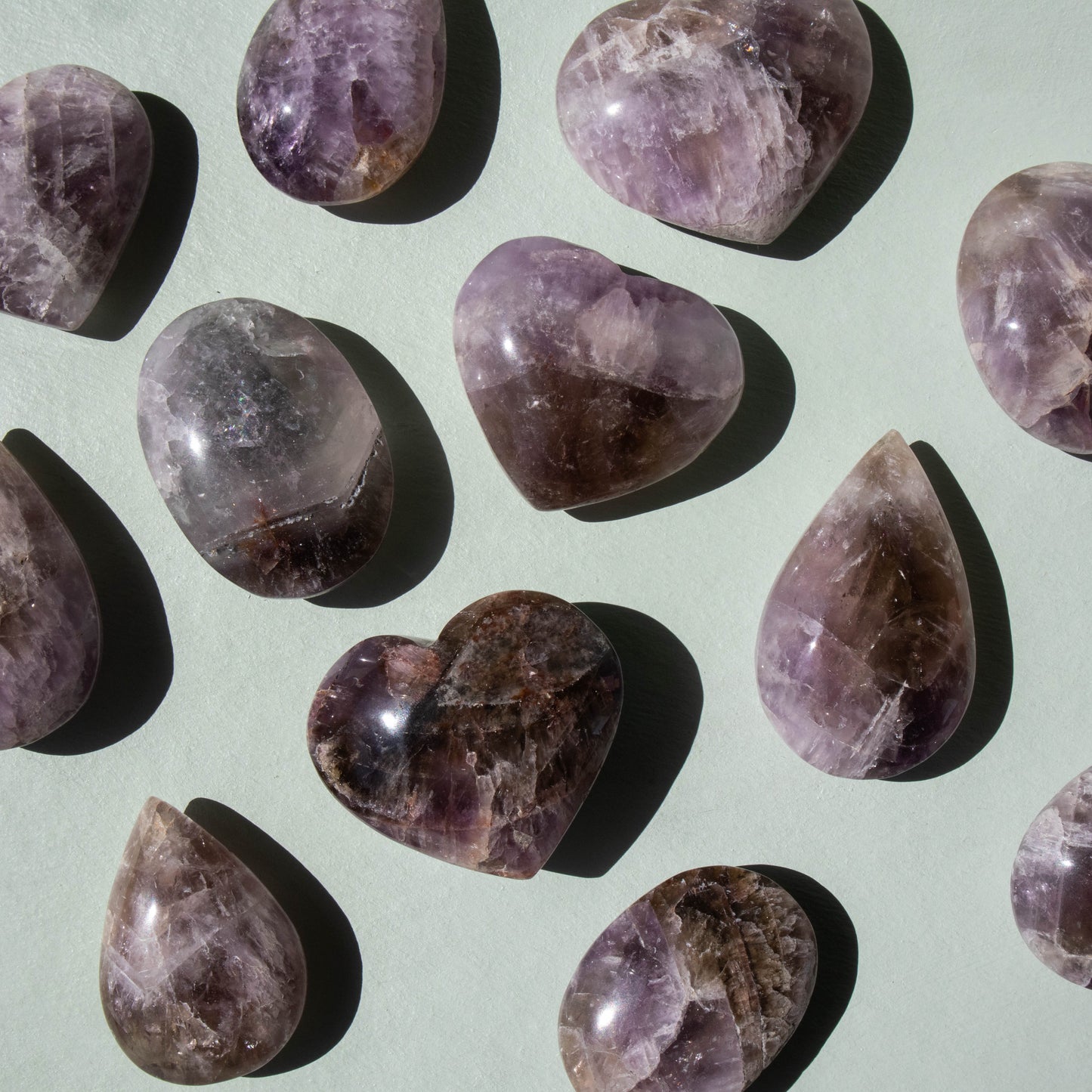 super 7, super 7 heart, super 7 palm stone, super 7 drop, crystal heart, crystal palm stone, crystal drop, super 7 shape, super 7 crystal, super 7 properties, super 7 healing properties, super 7 metaphysical properties, super 7 meaning