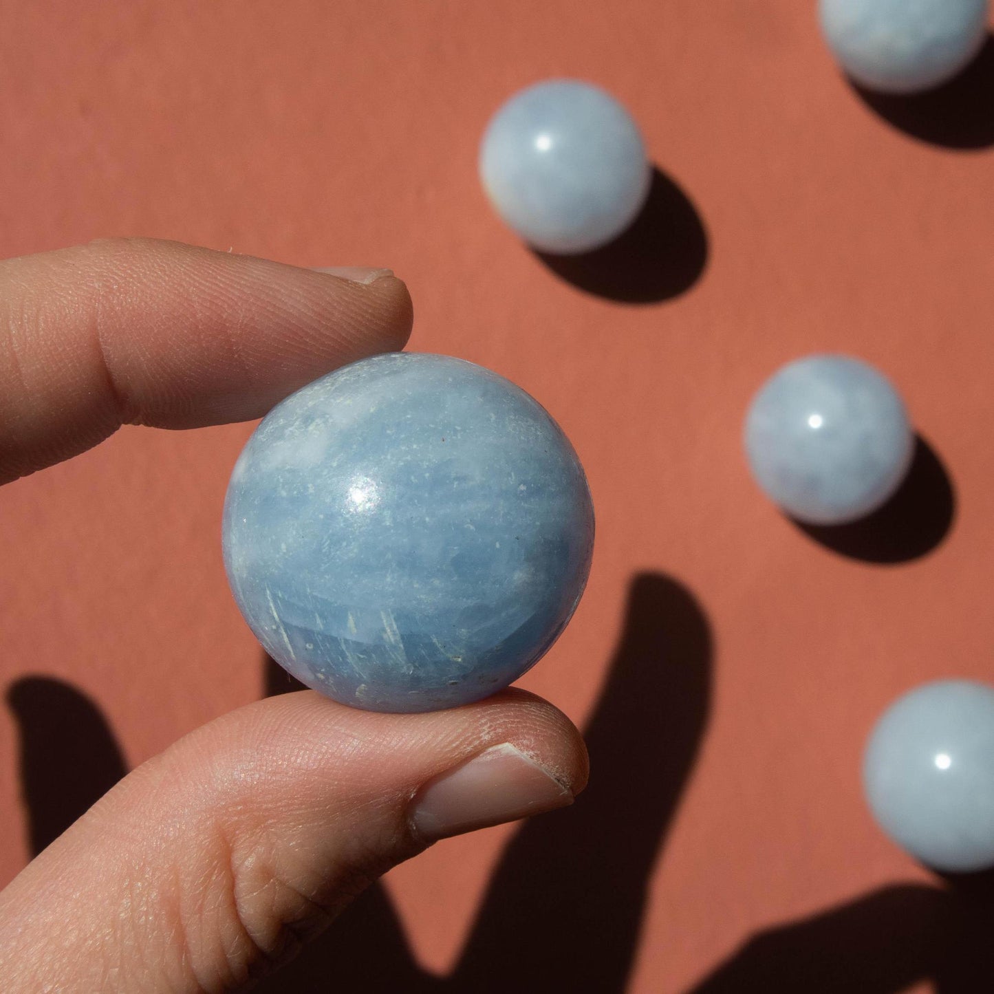 blue calcite, blue calcite sphere, crystal sphere, blue calcite crystal, blue calcite stone, blue calcite properties, blue calcite healing properties, blue calcite metaphysical properties, blue calcite meaning