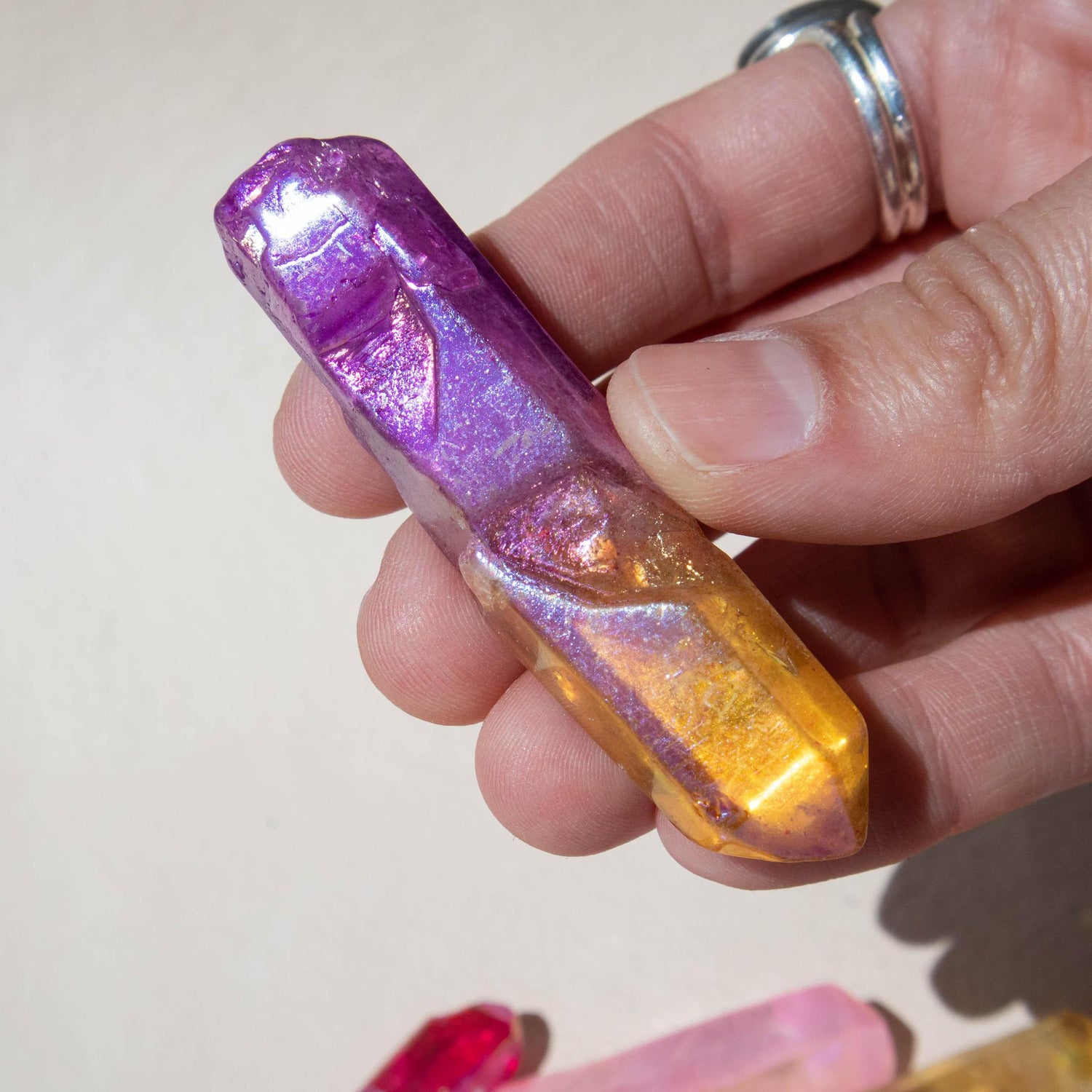 sunset aura, sunset aura quartz, aura quartz point, crystal point, sunset aura crystal, sunset aura stone, sunset aura properties, sunset aura healing properties, sunset aura metaphysical properties, sunset aura meaning